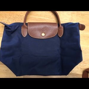 Small Longchamp. Short handles